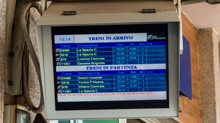 Notice board with train delays in Levanto, Cinque Terre, Italy